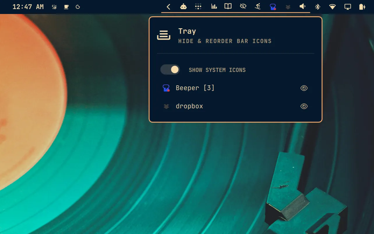 Tray's expanded bar drawer and controls for showing or hiding system tray icons.